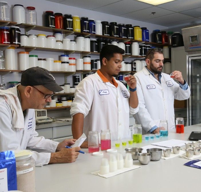 command-team-members-taste-testing-nutritional-supplement-drinks